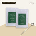 CycleBloom Two-Cycle Ritual: two pouches of CycleBloom loose leaf tea with a free long silver brewing spoon